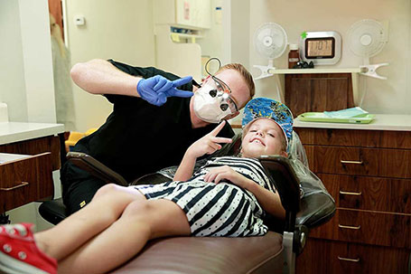 Dr. Tim Rauch in a candid moment with a young patient
