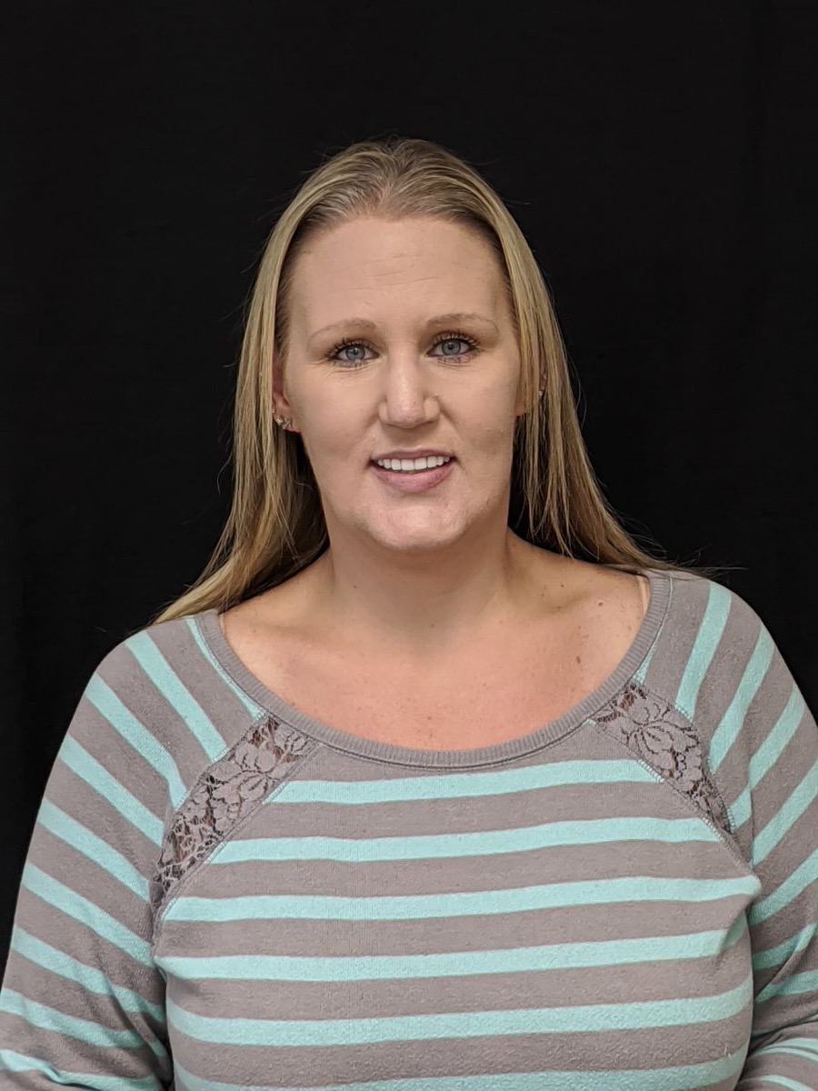 Jennifer's smile after a cosmetic smile makeover with Dr. Tim Rauch in Hollister, CA